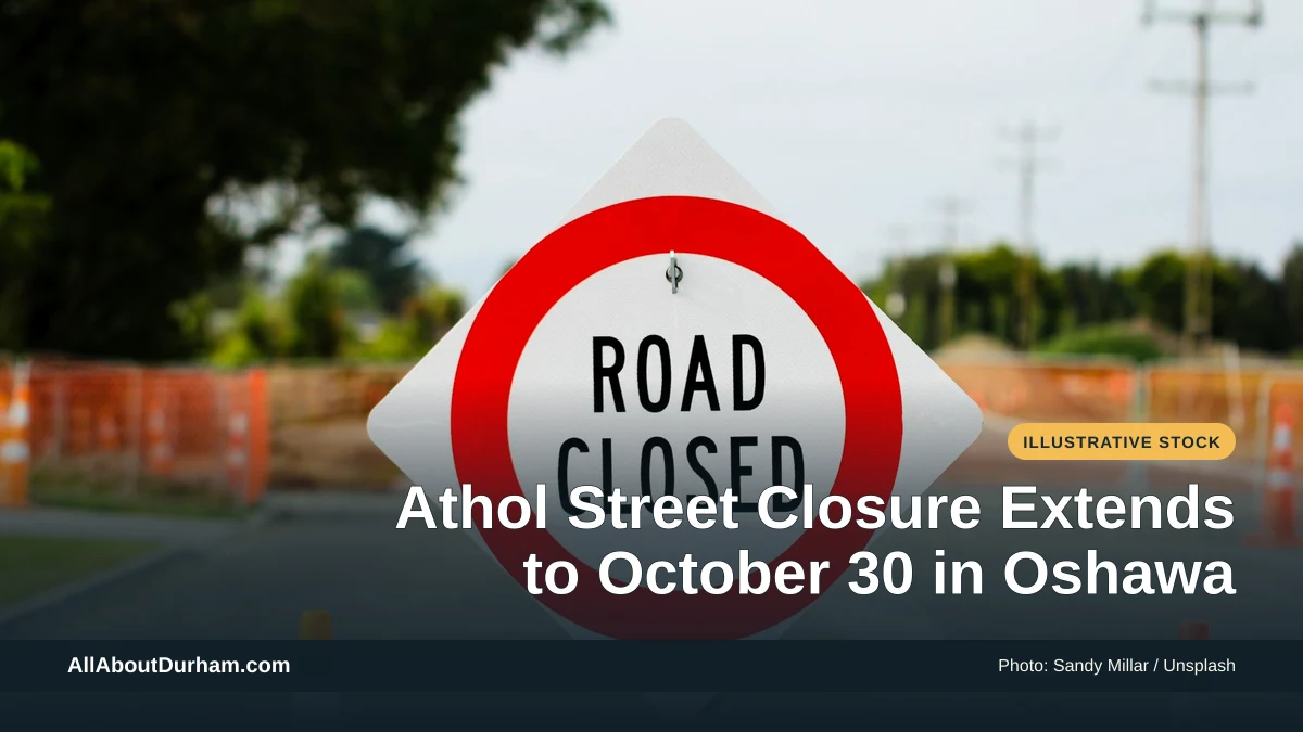 Illustrative stock photo: A road-closed sign on a street. Photo by Sandy Millar on Unsplash. Headline: Athol Street Closure Extends to October 30 in Oshawa. AllAboutDurham.com.